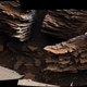 NASA’s Curiosity Mars rover captured this view of layered, flaky rocks believed to have formed in an ancient streambed or small pond.